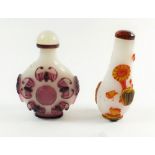 Two Chinese carved overlaid glass snuff bottles