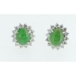 A pair of 18ct gold oval cut cabochon emerald and diamond cluster earrings, 4g,