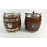 A pair of oak and silver plate biscuit barrels, 16cm high
