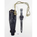 A military Eternal diving knife and a Silva diving watch