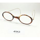 A pair of 9ct gold and tortoiseshell spectacles