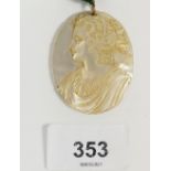 A Victorian mother of pearl carved pendant decorated classical lady, 4.5 x 3.5cm