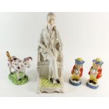 A group of Victorian Staffordshire figures including Wellington, two cruet figures etc, some damage