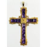 A large sized gold crucifix set facet cut amethysts with chalice motif and foliate terminals, 12 x