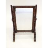 An 18th century walnut and mahogany small toiletry mirror, 46 x 28cm