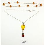 Two silver and amber necklaces