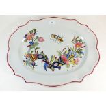 A large French faience serving dish painted flowers and butterfly, printed mark, 50 x 37cm