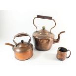 Two Victorian copper kettles and a mug