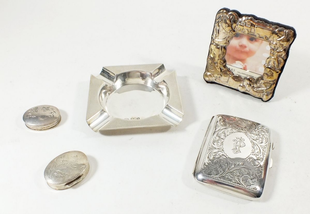 A silver cigarette case, Birmingham 1919, a silver ashtray Sheffield 1955, silver christening