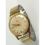 A gentleman's Limit gold plated wrist watch with flexible strap