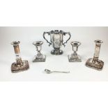 A silver plated Mappin and Webb two handled cup and two pairs of silver plated candlesticks