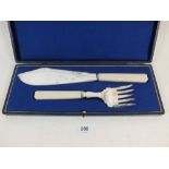 A pair of Art Deco silver plated and ivory handled fish servers cased
