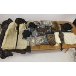 A large box of fur collars, trims, two mole skin coats and two sheepskin body warmers