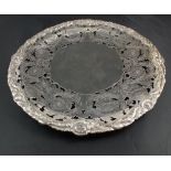 A fine Walker & Hall silver salver or cake stand with deep pierced and chased floral and foliage