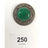 A silver celtic brooch set green stone, Glasgow 1959, 3.5cm