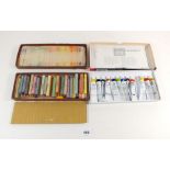 A 1920s/1930s box of "Reeves" artists pastels (set no. AP24) and a Shinhan box of watercolour paints