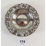 A Chinese pierced white metal pin dish, marked to back - 10cm diameter