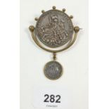 A brooch set Hungarian coin depicting St George and the Dragon