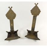 A pair of Indian brass square wall candle holders with embossed decoration, 30cm tall