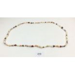 A multi coloured pearl necklace