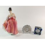 A Royal Doulton figure "Fair Lady", a Waterford cut glass clock and an Isle of Wight glass clock