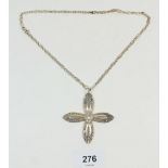An American silver cross pendant by Towle on a silver chain