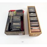 Two boxes of glass magic lantern slides