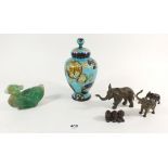 A green carved jade bird, cloisonne vase, three brass elephants etc. All A/F