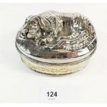 A silver plated oval box with dog asleep to lid - 13.5 x 10cm