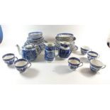 A selection of blue and white china comprising: six cups, six saucers, teapot, coffee pot without