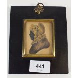 A Victorian watercolour silhouette of an old woman in ebony frame - total size 13 x 11cm