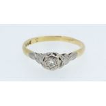 An antique 18ct gold and platinum ring with illusion set diamond, size N, 1.8g