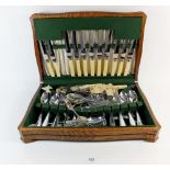 A chrome plated cutlery set - cased