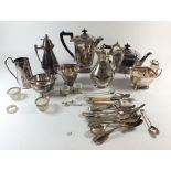 A four piece silver plated tea service and other silver plated items