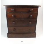 A Victorian stained pine egg collectors cabinet of four drawers with inner divisions, 30 x 22 x