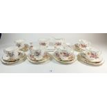 A Crown Derby "Derby Posies" tea service comprising: six cups and saucers, six tea plates, jug and
