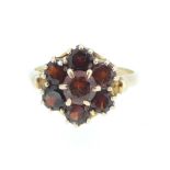 A 9ct gold and garnet cluster ring, size K, 2.8g