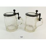 Two 19th century cut glass pewter mounted tankards