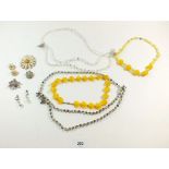 Two vintage crystal necklaces, a daisy brooch and matching earrings etc.
