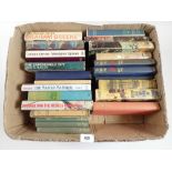 A collection of twenty three hardback books including G.Greene, L.Deighton, L.Charters etc. Many