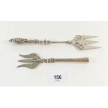 A Victorian silver cake fork, Birmingham 1922 and a German silver plated one