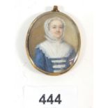 A 19th century watercolour on ivory miniature of a woman in blue dress with lace collar