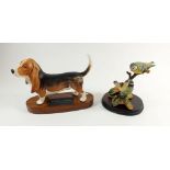 A Beswick Connoisseur Bassett hound and an Aynsley Mastercraft blue tit group