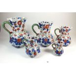 A set of five Mason's style graduated jugs, the largest 25cm