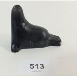An Inuit stone carving of a walrus, signed KF from Pangnirtung, Baffin Island, Canada - 6 x 7.5cm