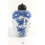 An 18th century Chinese blue and white vase with panelled decoration - 18cm, badly damaged