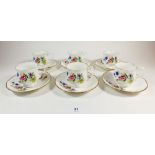 A set of six Royal Minster floral cups and saucers