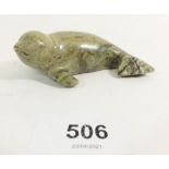 An Inuit green stone carved seal, 8cm