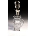 A 1930's square cut glass claret decanter with Spanish "915 standard" silver collar and spout, 30.