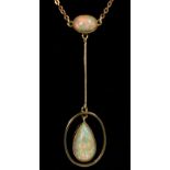 A 14 carat gold Edwardian Art Nouveau pendant set opal and opal drop